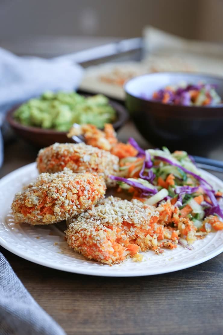 Sweet Potato and Parsnip Fritters crusted with sunflower seeds - a delightful vegan and paleo side dish or dinner