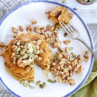 Vegan Pumpkin Pancakes with Maple-Toasted Walnuts and Pumpkin Seeds. You'd never know these pancakes are gluten-free and vegan!