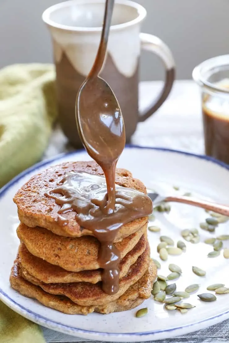 Vegan Pumpkin Pancakes with Chai-Spiced Paleo Salted Caramel - moist and fluffy pancakes you'd never know are gluten-free and vegan!
