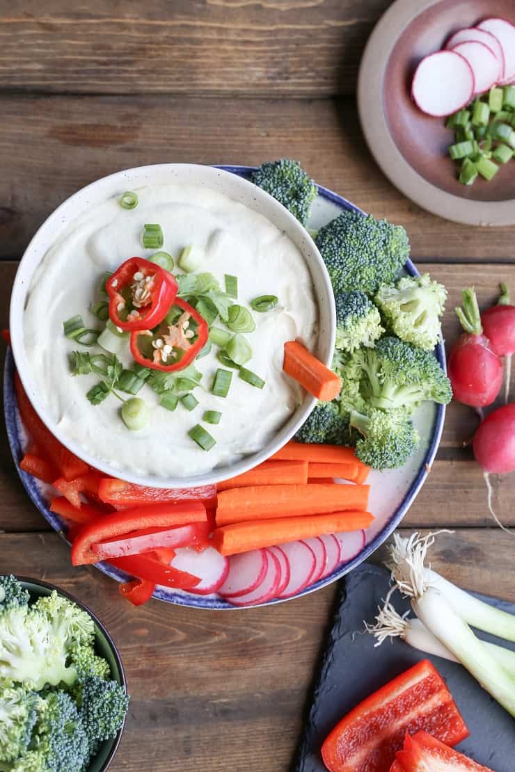 Paleo Sour Cream & Onion Dip - a luscious dip for chips and raw vegetables that's dairy-free, vegan, and paleo friendly. A healthier take on the classic dip!