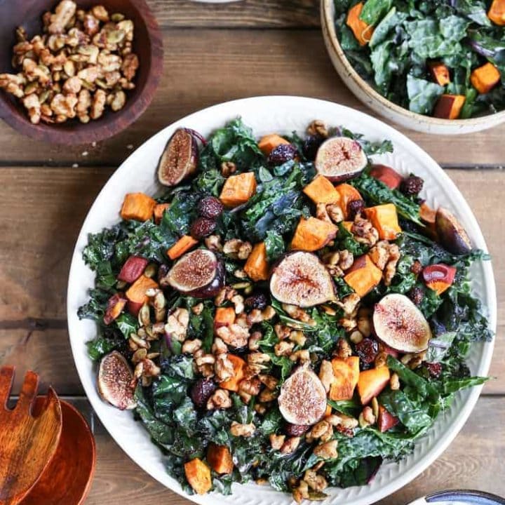 Roasted Sweet Potato and Fig Kale Salad with maple-toasted walnuts, dried cranberries, and cider vinaigrette - a healthful superfood salad that can be enjoyed as an entree or a side dish!