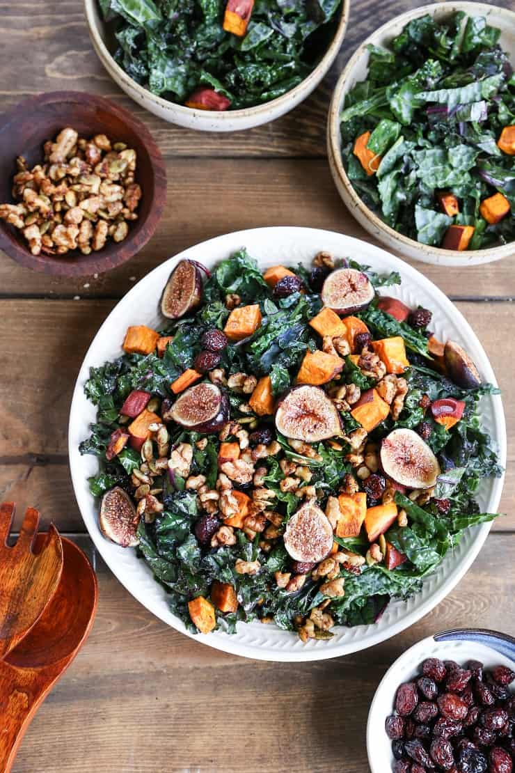 Roasted Sweet Potato and Fig Kale Salad with maple-toasted walnuts, dried cranberries, and cider vinaigrette - a healthful superfood salad that can be enjoyed as an entree or a side dish!