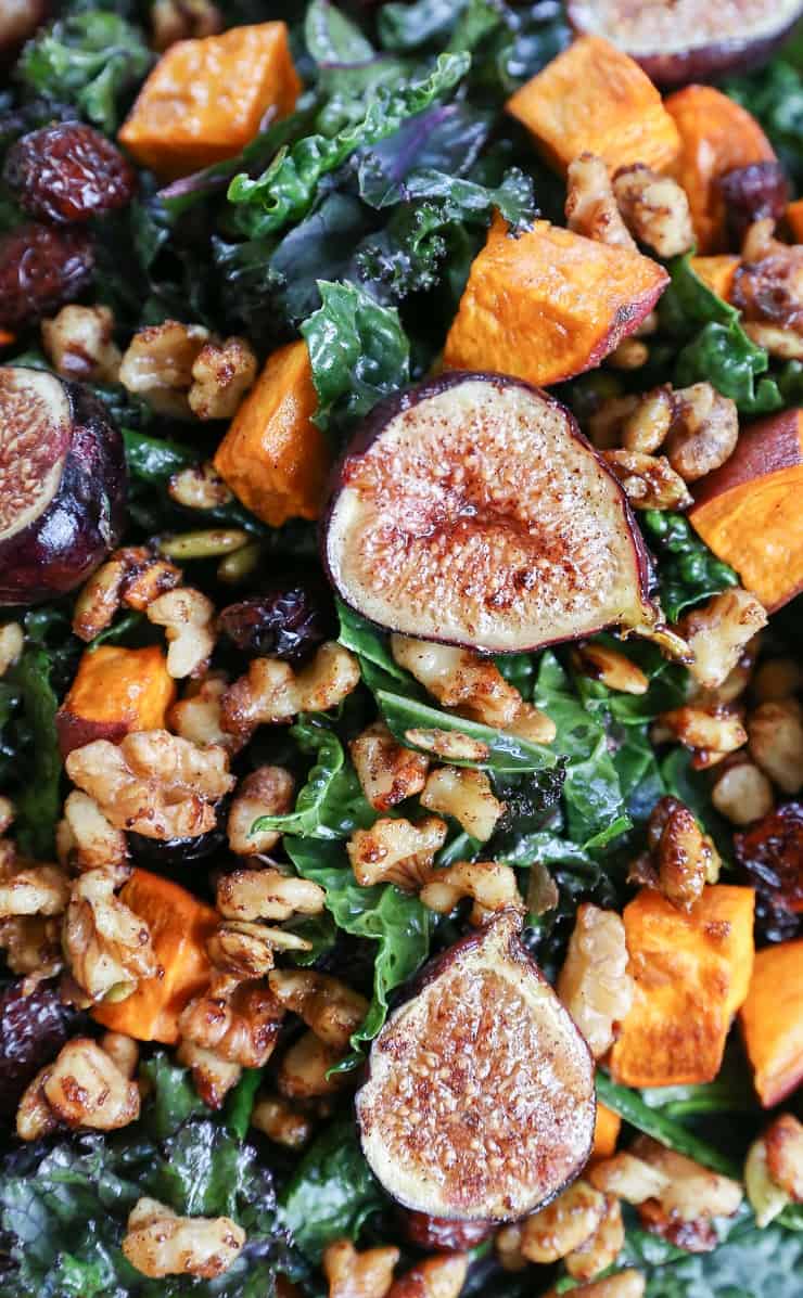 ROASTED SWEET POTATO AND FIG KALE SALAD WITH MAPLE-CINNAMON CIDER VINAIGRETTE Roasted Sweet Potato and Fig Kale Salad with maple-toasted walnuts, dried cranberries, and cider vinaigrette - a healthful superfood salad that can be enjoyed as an entree or a side dish!
