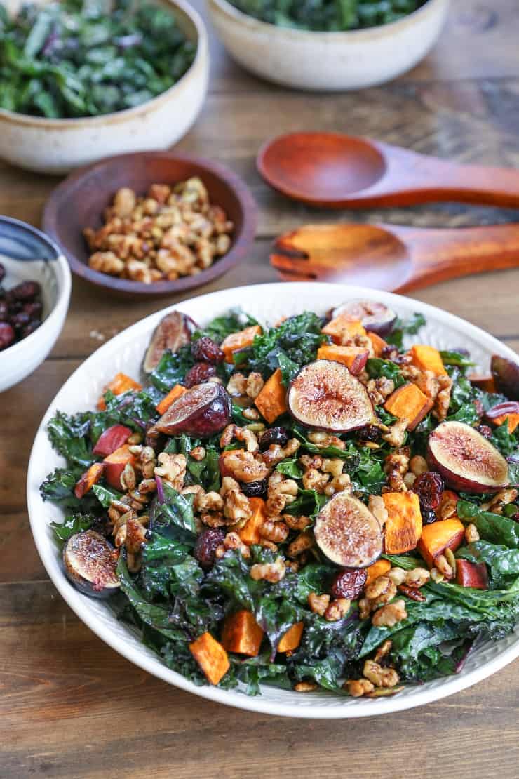 ROASTED SWEET POTATO AND FIG KALE SALAD WITH MAPLE-CINNAMON CIDER VINAIGRETTE Roasted Sweet Potato and Fig Kale Salad with maple-toasted walnuts, dried cranberries, and cider vinaigrette - a healthful superfood salad that can be enjoyed as an entree or a side dish!