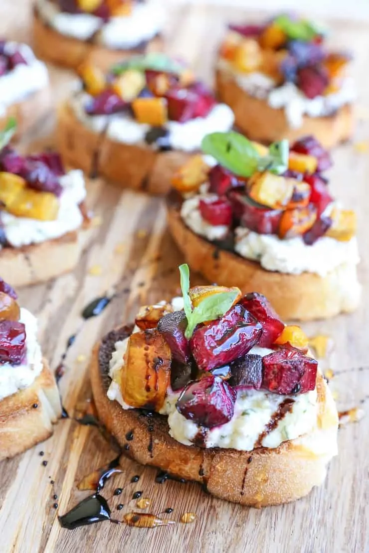Roasted Beet Herbed Vegan Ricotta Crostini with balsamic reduction drizzle - this delicious and nutritious appetizer is plant-based and dairy-free!