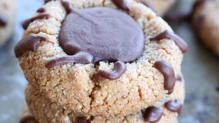 Paleo Chocolate Thumbprint Cookies - grain-free, dairy-free, naturally sweetened, made with almond flour, coconut oil, and pure maple syrup. This healthy gluten free cookie recipe is perfect for the holidays.