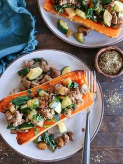 Turkey-Stuffed Butternut Squash with zucchini, mushrooms, and spinach. This healthy meal is paleo, AIP, and delicious!