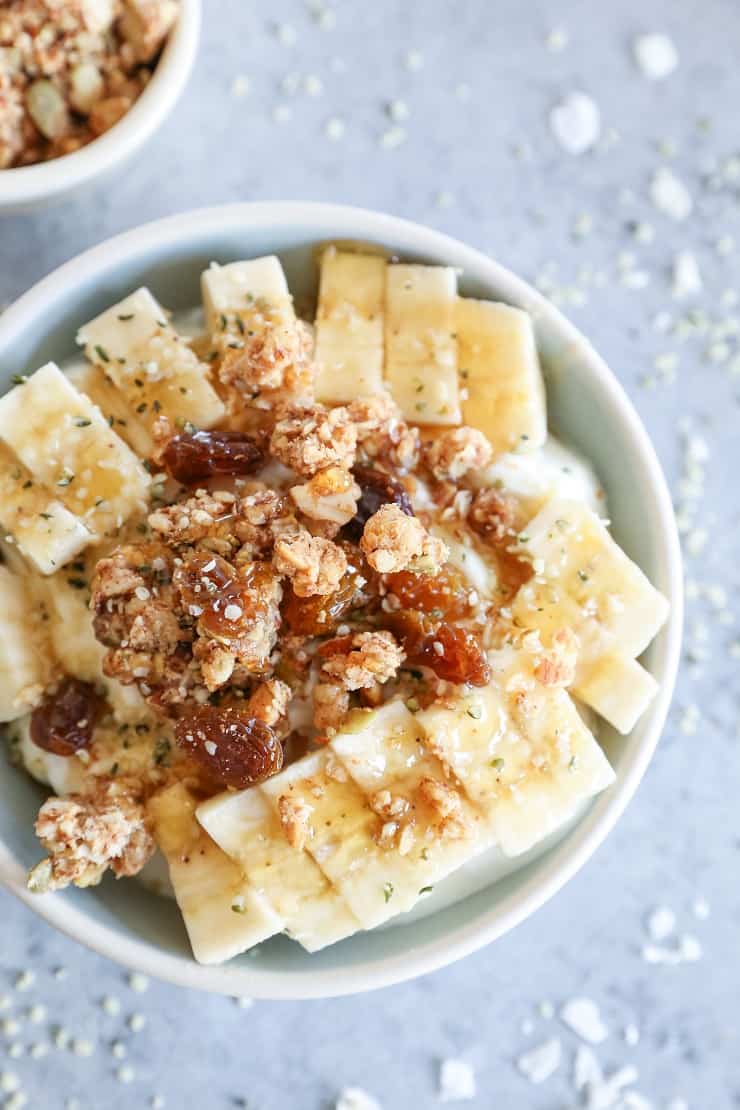 CINNAMON RAISIN PALEO GRANOLA (VEGAN) Cinnamon Raisin Paleo Granola (Vegan) - made with nuts, seeds, nut butter, and pure maple syrup for a nutritious gluten-free breakfast or snack.
