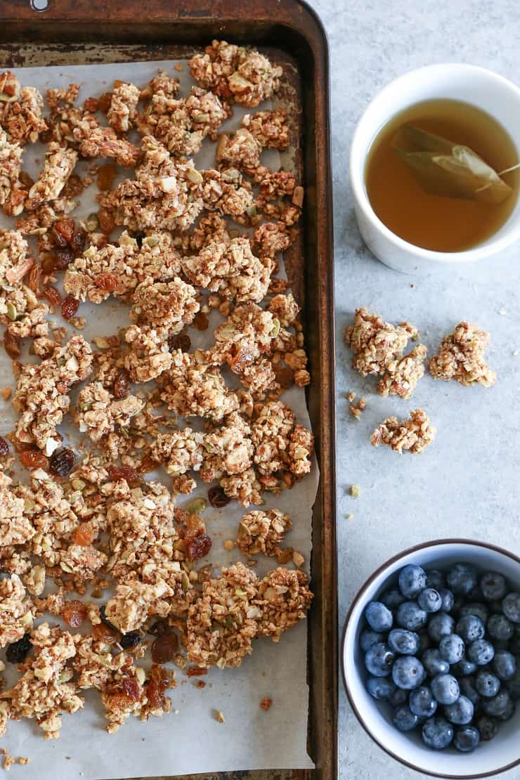 CINNAMON RAISIN PALEO GRANOLA (VEGAN) Cinnamon Raisin Paleo Granola (Vegan) - made with nuts, seeds, nut butter, and pure maple syrup for a nutritious gluten-free breakfast or snack.