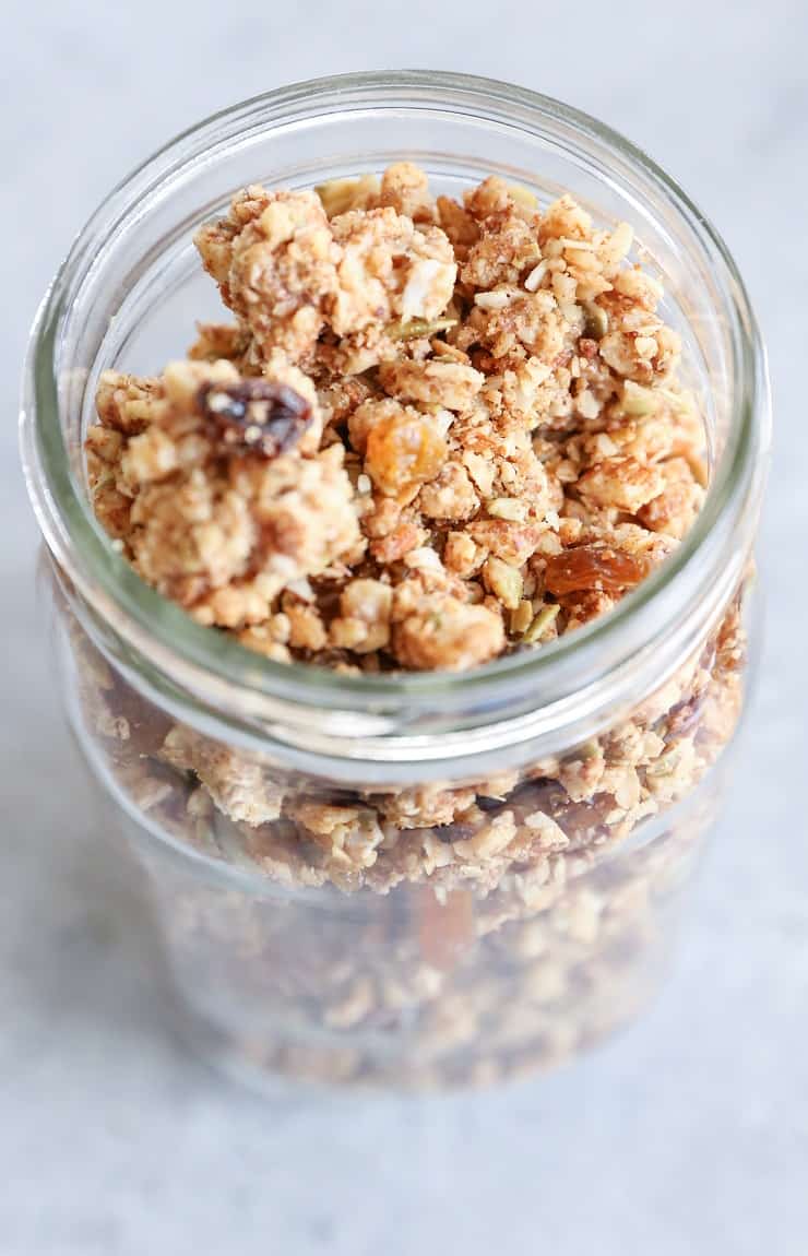 CINNAMON RAISIN PALEO GRANOLA (VEGAN) Cinnamon Raisin Paleo Granola (Vegan) - made with nuts, seeds, nut butter, and pure maple syrup for a nutritious gluten-free breakfast or snack.