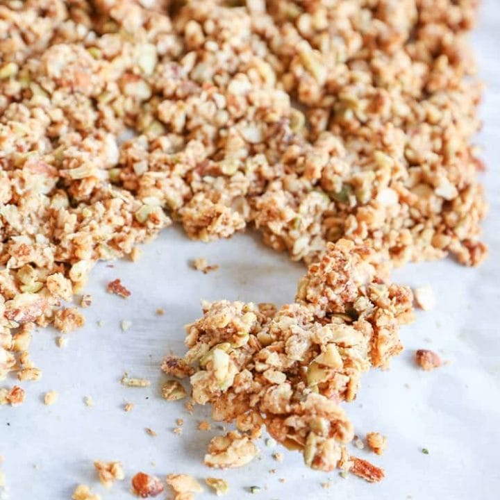 Cinnamon Raisin Paleo Granola (Vegan) - made with nuts, seeds, nut butter, and pure maple syrup for a nutritious gluten-free breakfast or snack.