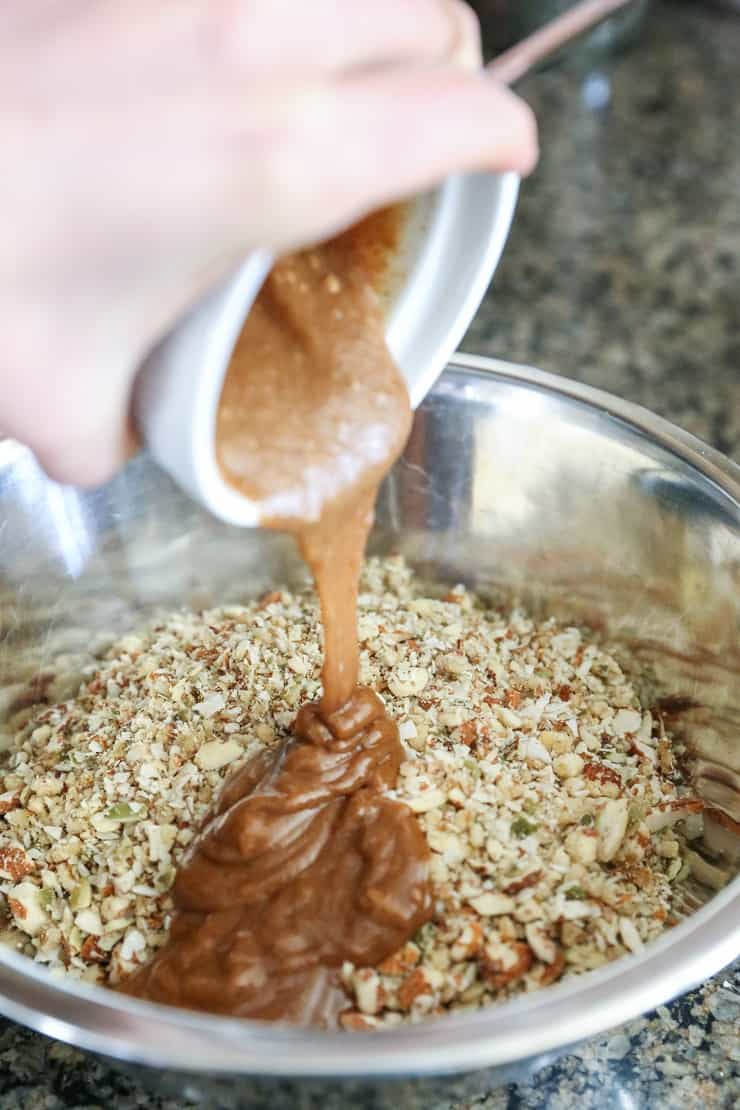 CINNAMON RAISIN PALEO GRANOLA (VEGAN) Cinnamon Raisin Paleo Granola (Vegan) - made with nuts, seeds, nut butter, and pure maple syrup for a nutritious gluten-free breakfast or snack.