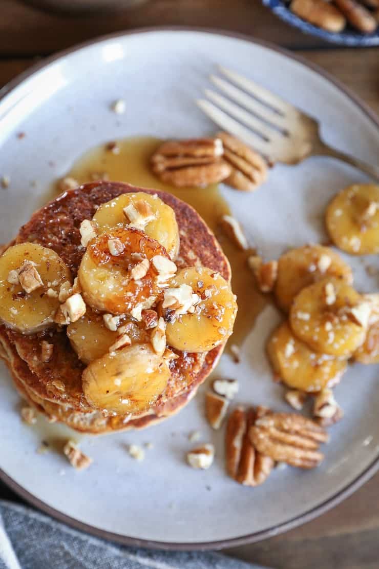 Bananas Foster Banana Pancakes - an epic banana experience. These gluten-free banana pancakes are made with rice flour and almond flour in your blender
