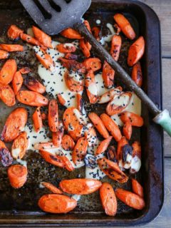 Orange-Ginger Roasted Carrots - a healthy flavorful side dish that happens to be paleo and vegan