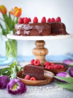 Paleo Chocolate Cake made with almond flour, pure maple syrup, and coconut oil. This easy cake is made in a blender!