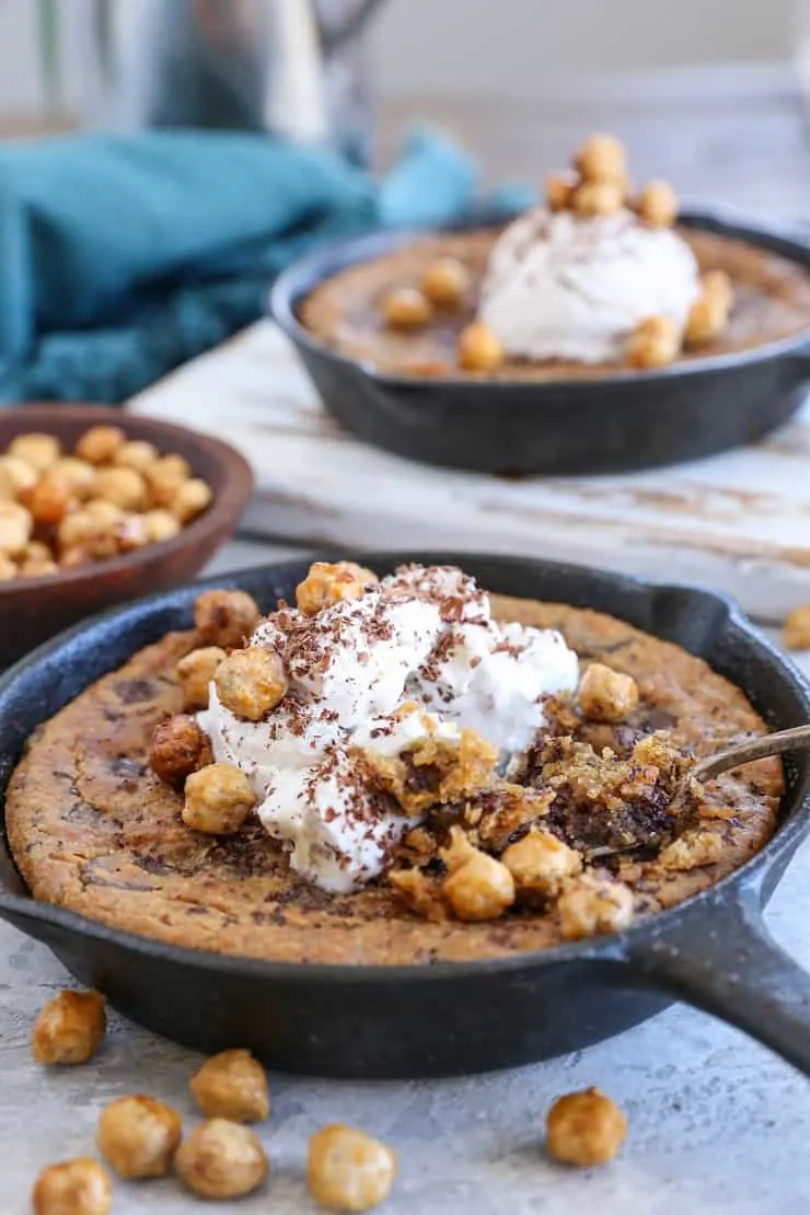 Almond Butter Chocolate Chip Skillet Cookie made with chickpeas, pure maple syrup, and almond butter for a healthier treat