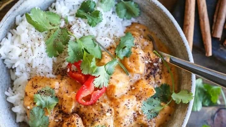 Chicken Massaman Curry - butternut squash and chicken stewed in aromatic coconut milk sauce for a satisfying meal that happens to be healthier than Thai takeout. Paleo, Whole30, and delicious