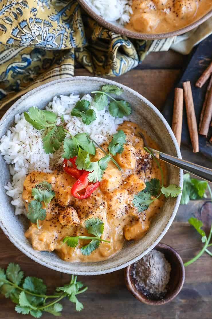 Chicken Massaman Curry - butternut squash and chicken stewed in aromatic coconut milk sauce for a satisfying meal that happens to be healthier than Thai takeout. Paleo, Whole30, and delicious