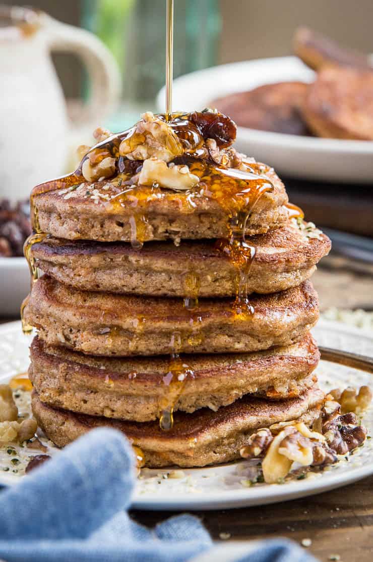 Paleo Carrot Cake Pancakes - grain-free, refined sugar-free, dairy-free, and healthy! These paleo pancakes taste like dessert for breakfast 