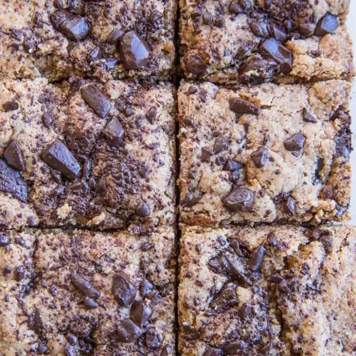 Chocolate Chip Paleo Blondies - grain-free, dairy-free, refined sugar-free blondies made with almond flour and coconut sugar. These delicious bars are vegan and healthier gluten-free, low sugar dessert option.