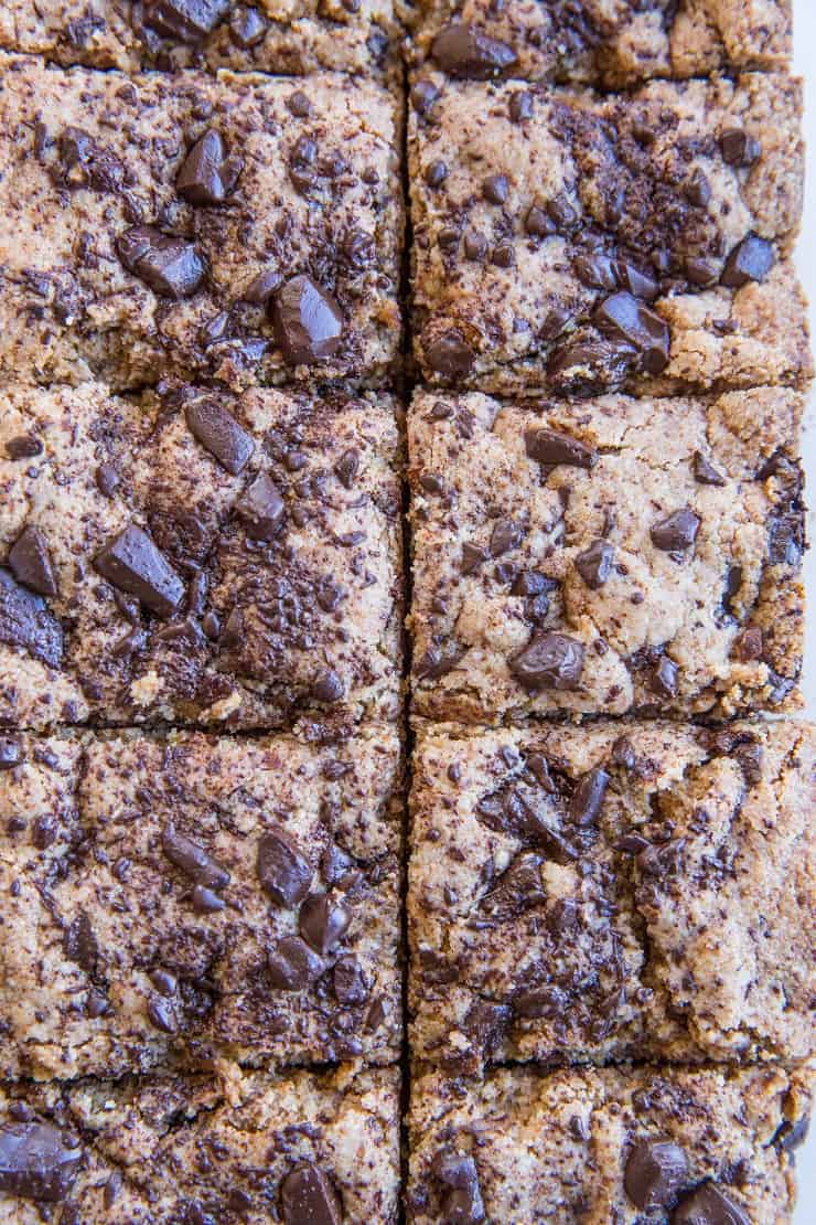 Chocolate Chip Paleo Blondies - grain-free, dairy-free, refined sugar-free blondies made with almond flour and coconut sugar. These delicious bars are vegan and healthier gluten-free, low sugar dessert option.