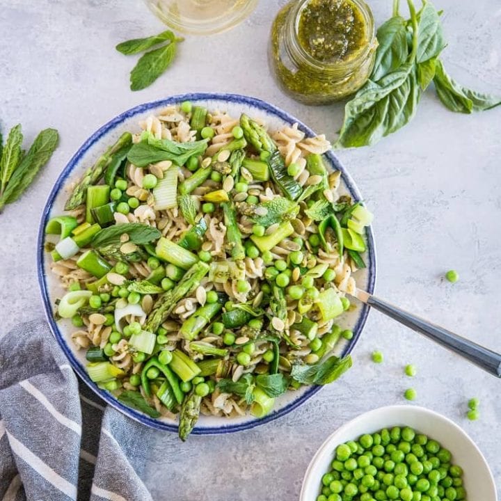Spring Green Pasta with Vegan Basil-Mint Pesto - a healthy pasta recipe with asparagus, peas, leek, and homemade pesto sauce