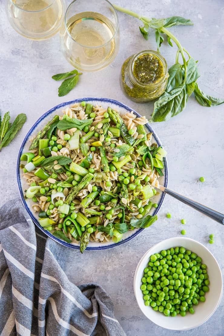 Spring Green Pasta with Vegan Basil-Mint Pesto - a healthy pasta recipe with asparagus, peas, leek, and homemade pesto sauce