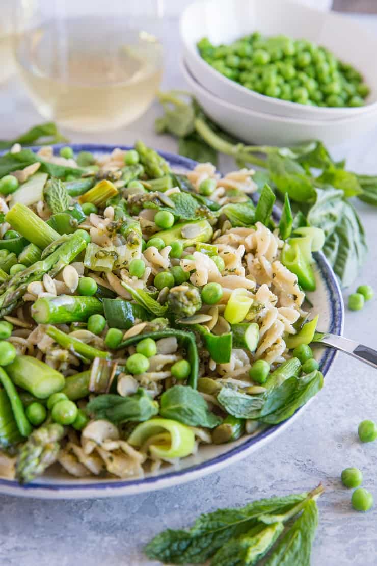 Spring Green Pasta with Vegan Basil-Mint Pesto Sauce - gluten-free pasta with asparagus, leek, peas, pumpkin seeds, and homemade vegan pesto