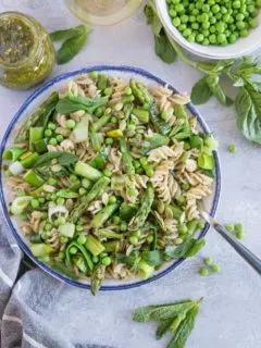 Spring Green Pasta with Basil-Mint Pesto, asparagus, peas, leek, pumpkin seeds. This fresh and vibrant pasta is perfectly light yet filling