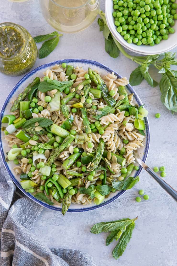 Spring Green Pasta with Basil-Mint Pesto, asparagus, peas, leek, pumpkin seeds. This fresh and vibrant pasta is perfectly light yet filling