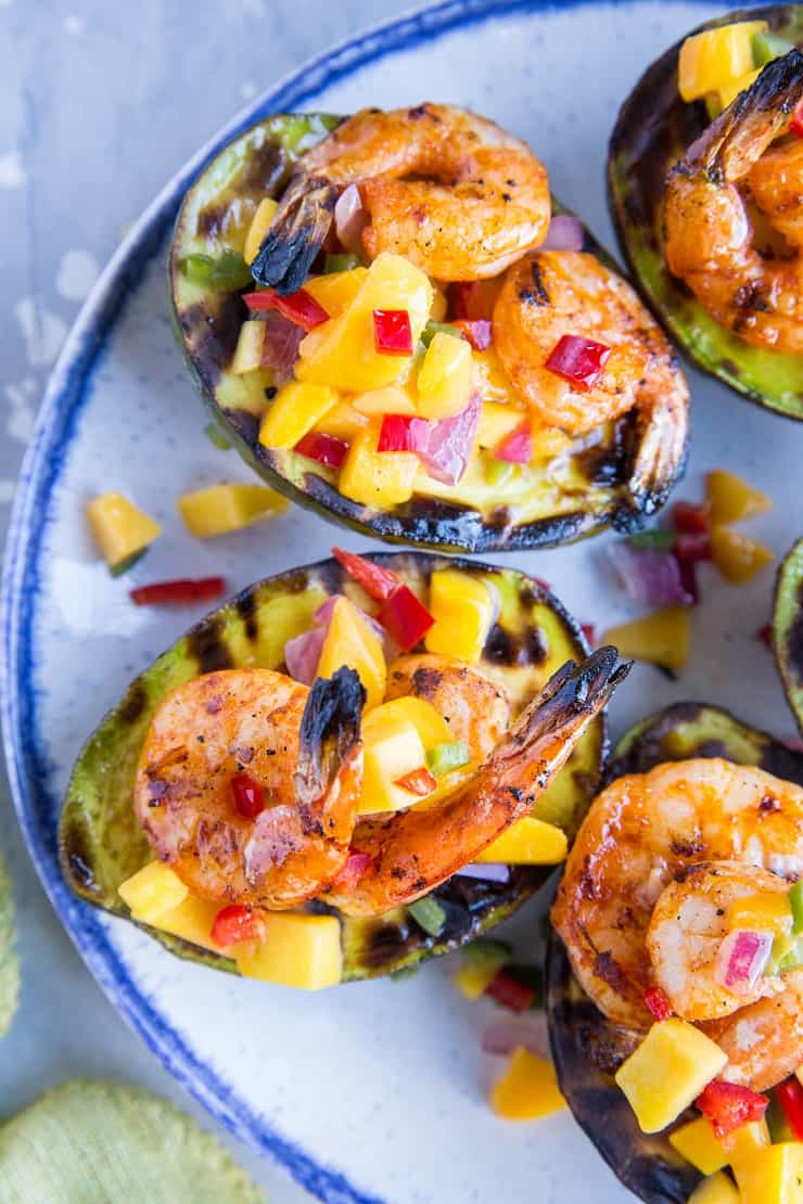 Stuffed Grilled Avocados with Grilled Shrimp and Mango Salsa - a healthy paleo appetizer perfect for grilling season