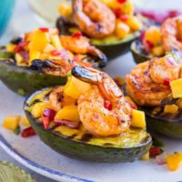 Stuffed Grilled Avocados with Grilled Shrimp and Mango Salsa - a healthy paleo appetizer perfect for grilling season