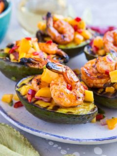 Stuffed Grilled Avocados with Grilled Shrimp and Mango Salsa - a healthy paleo appetizer perfect for grilling season