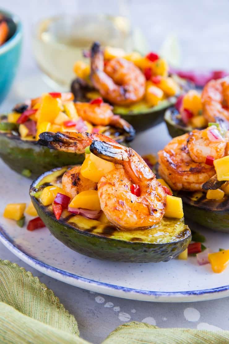 Stuffed Grilled Avocados with Grilled Shrimp and Mango Salsa - a healthy paleo appetizer perfect for grilling season