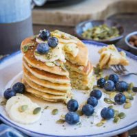 Paleo Lemon Poppy Seed Pancakes made with almond flour and almond milk. This zesty stack is healthy and delicious! Dairy-free, refined sugar-free, and grain-free