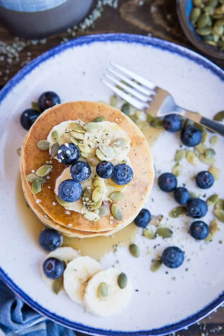 Paleo Lemon Poppy Seed Pancakes are a healthy breakfast made with almond flour and almond milk in your blender! Grain-free and dairy-free