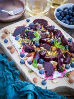 Roasted Beet Salad with Herbed Whipped Ricotta and Citrus Dressing with roasted almonds and blueberries - a perfect sharable dish for brunch