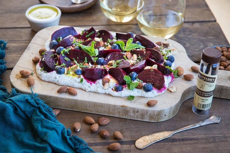 Roasted Beet Salad with Herbed Whipped Ricotta and Citrus Dressing with roasted almonds and blueberries - a perfect sharable dish for brunch