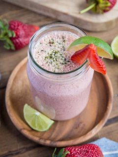 Strawberry Protein Smoothie - packed with plant-based protein, cauliflower, almond milk, yogurt, almond butter, dates and lime juice, this healthy banana-free smoothie is a perfect post-workout meal in a glass