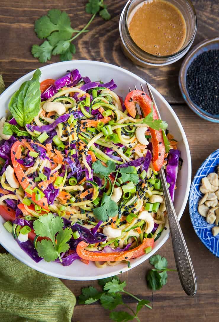 Thai Zucchini Noodles with Sesame Almond Ginger Sauce - a healthy plant-based meal that's both paleo and vegan and only requires 30 minutes to prepare