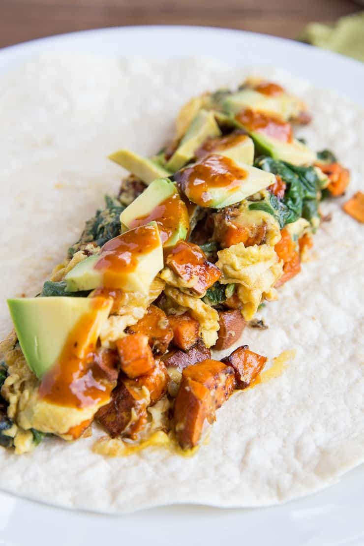 Roasted Veggie and Avocado Breakfast Burritos with sweet potato and zucchini - these healthy breakfast burritos are packed with nutrients.