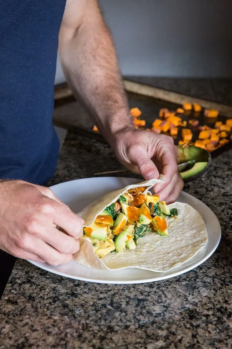 Roasted Veggie and Avocado Breakfast Burritos with sweet potato and zucchini - these healthy breakfast burritos are packed with nutrients.