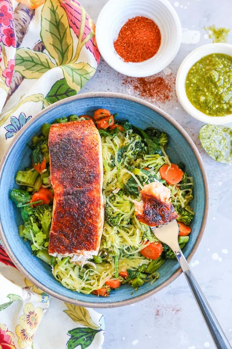 Crispy Salmon Bowls with Pesto Spaghetti Squash and Sauteed Vegetables - these nutritious bowls are keto, paleo, low-carb, and whole30 | TheRoastedRoot.com @TheRoastedRoot #glutenfree