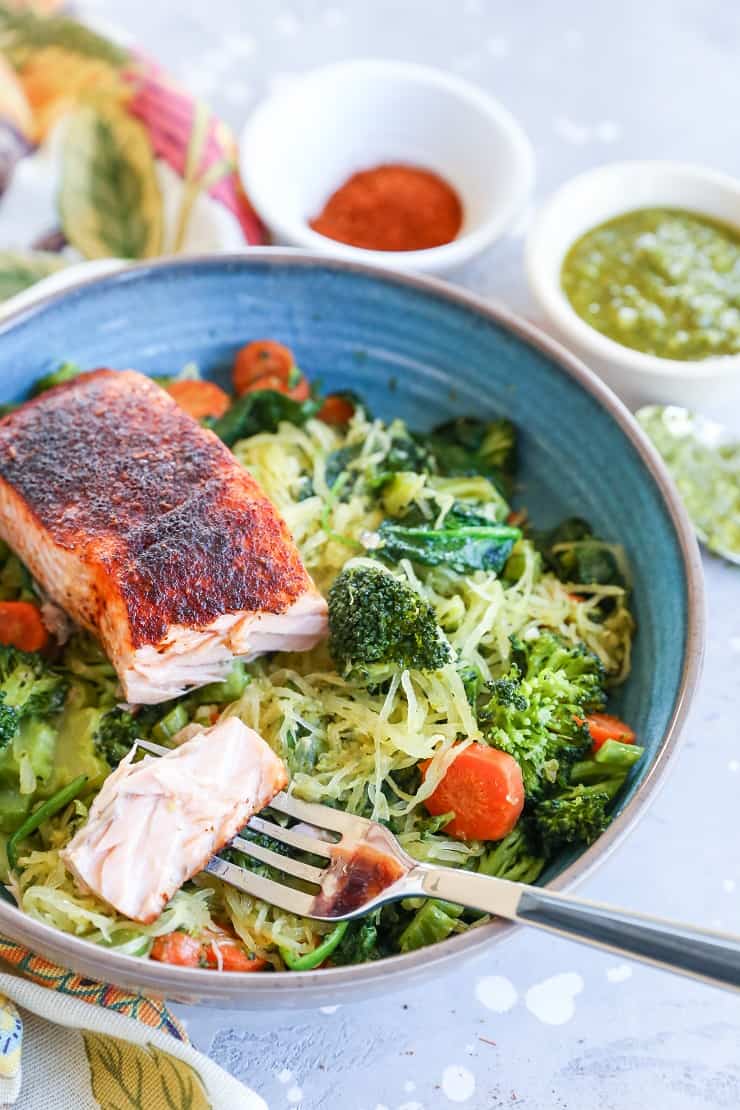 Crispy Salmon Bowls with Pesto Spaghetti Squash and Sauteed Vegetables - these nutritious bowls are keto, paleo, low-carb, and whole30 | TheRoastedRoot.com @TheRoastedRoot #glutenfree