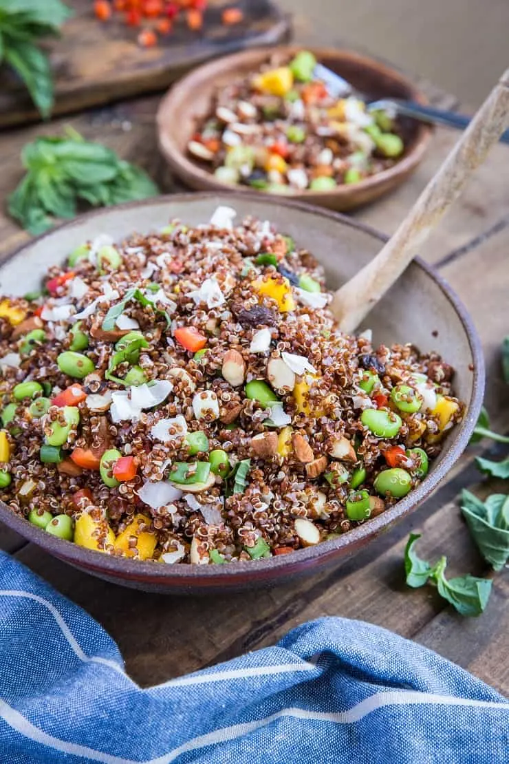 Mango Edamame Quinoa Salad with roasted almonds, flaked coconut, bell pepper, and basil. A highly nutritious salad perfect for picnics and barbecues