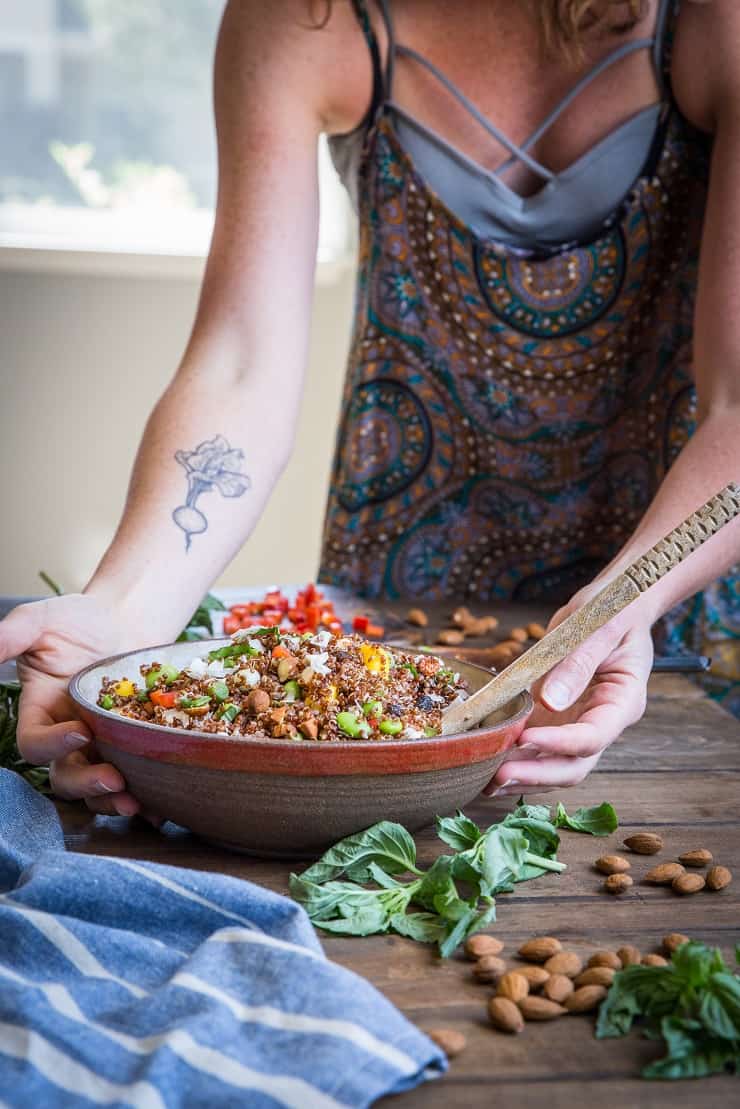 Mango Edamame Quinoa Salad with bell pepper, flaked coconut, roasted almonds, and basil. A healthful vegan side dish