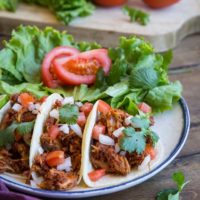 Carnitas and Chorizo Tacos - slow cooked shredded pork and chorizo make an amazingly flavorful taco! Set it up in the morning and have it ready by the time you get home from work! | TheRoastedRoot.net #glutenfree