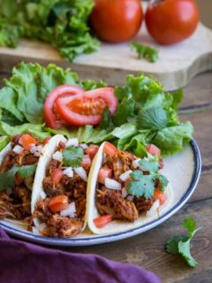 Carnitas and Chorizo Tacos - slow cooked shredded pork and chorizo make an amazingly flavorful taco! Set it up in the morning and have it ready by the time you get home from work! | TheRoastedRoot.net #glutenfree