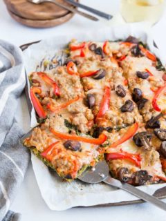 Sausage and Mushroom Kale Crust Pizza | TheRoastedRoot.net #keto #lowcarb