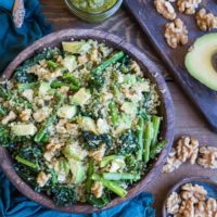 Pesto Quinoa Salad with Kale, Asparagus, Avocado, Walnuts, and Feta. A light and refreshing side dish perfect for sharing